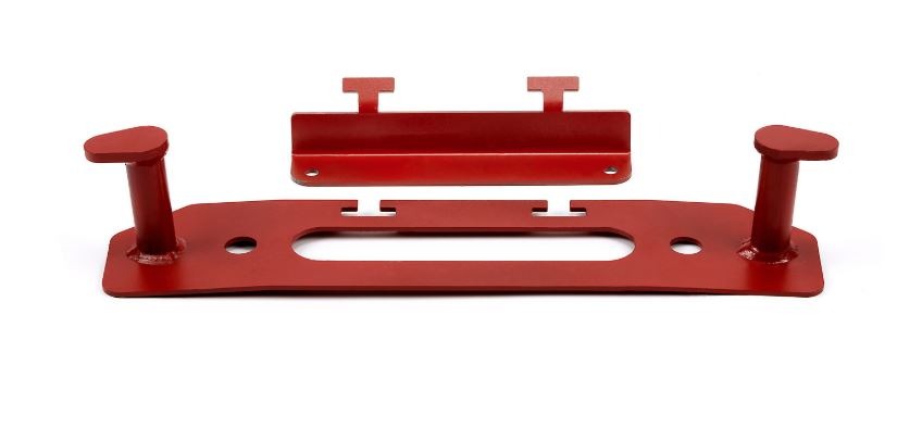 Warn Red fairlead mounting plate that fills gap in factory bumper; features stanchions for winch rope and hook and license plate mounting bracket