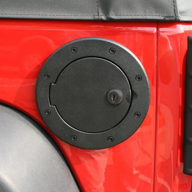 Rugged Ridge RUG Fuel Tank Caps / Doors by Rugged Ridge