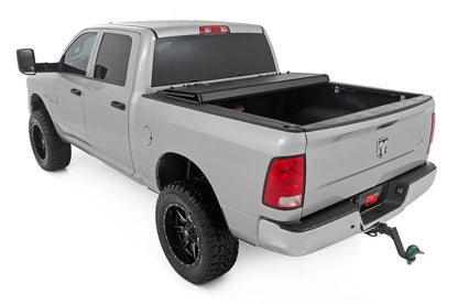 Rough Country Hard Tri-Fold Flip Up Bed Cover | 6'4" Bed | Ram 1500/2500/3500 (10-25 & Classic) by Rough Country