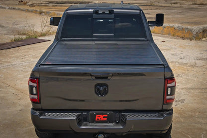 Rough Country Hard Roll Up Bed Cover | 6'4" Bed | Ram 1500 (09-18)/2500 (09-26) by Rough Country