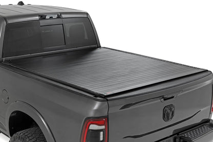 Rough Country Hard Roll Up Bed Cover | 6'4" Bed | Ram 1500 (09-18)/2500 (09-26) by Rough Country