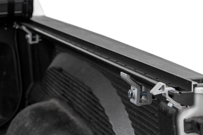 Rough Country Hard Roll Up Bed Cover | 5'7" Bed | Ram 1500 (09-18)/2500 (09-26)