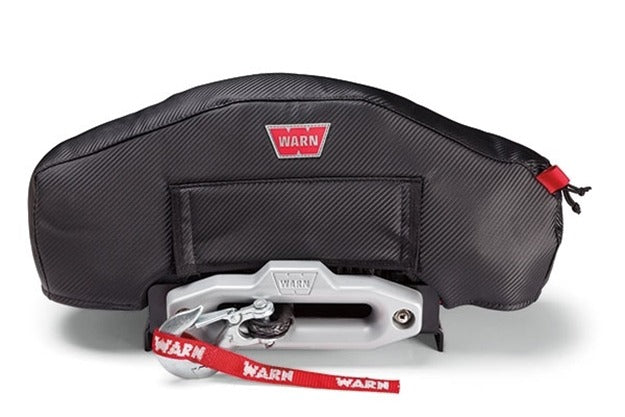 Warn Fits Zeon and Zeon Platinum Winches; Vinyl With Mesh Backing; Front Flap Allows Access To Winch Drum; Zipper Allows Access To Clutch Handle And Remote Socket