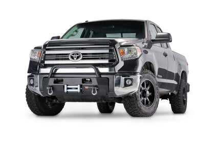 Warn Mounts WARN ZEON or VR EVO winch onto front of the Toyota Tundra. Removes the vulnerable center section of the front bumper cover and replaces with heavy duty winch mount while retaining the factory appearance. With grille guard tube.