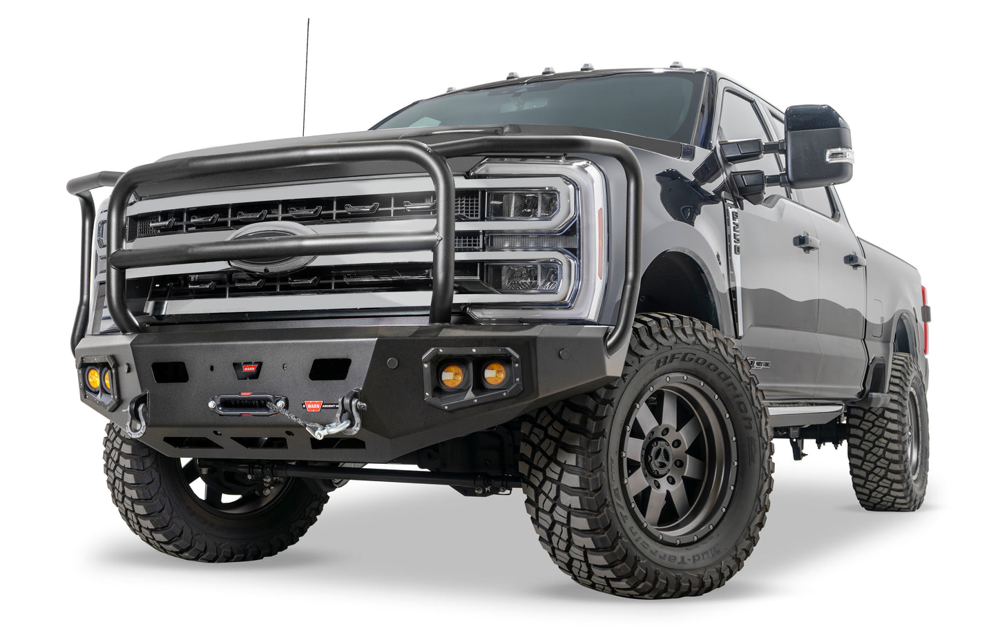 WARN Ascent HD front bumper for Ford F250 - F600 featuring a full grille guard and integrated winch mount that will accept large or mid-frame winches up to 18,000 lbs in capacity.
