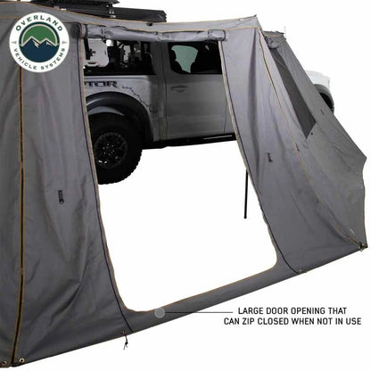 OVS HD Nomadic 270 - Awning Wall 1 W/Door & Window, Passenger Side, Grey Body, Green Trim W/Storage Bag by OVS
