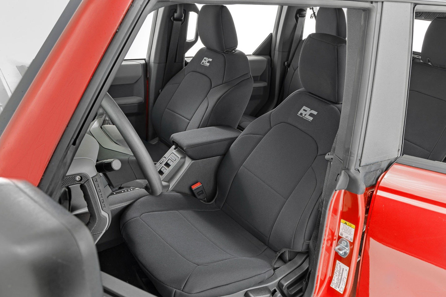 Fundas de asiento | Asientos individuales delanteros | Con reposabrazos trasero abatible | Delanteros y traseros | 4 puertas | Ford Bronco (21-25)