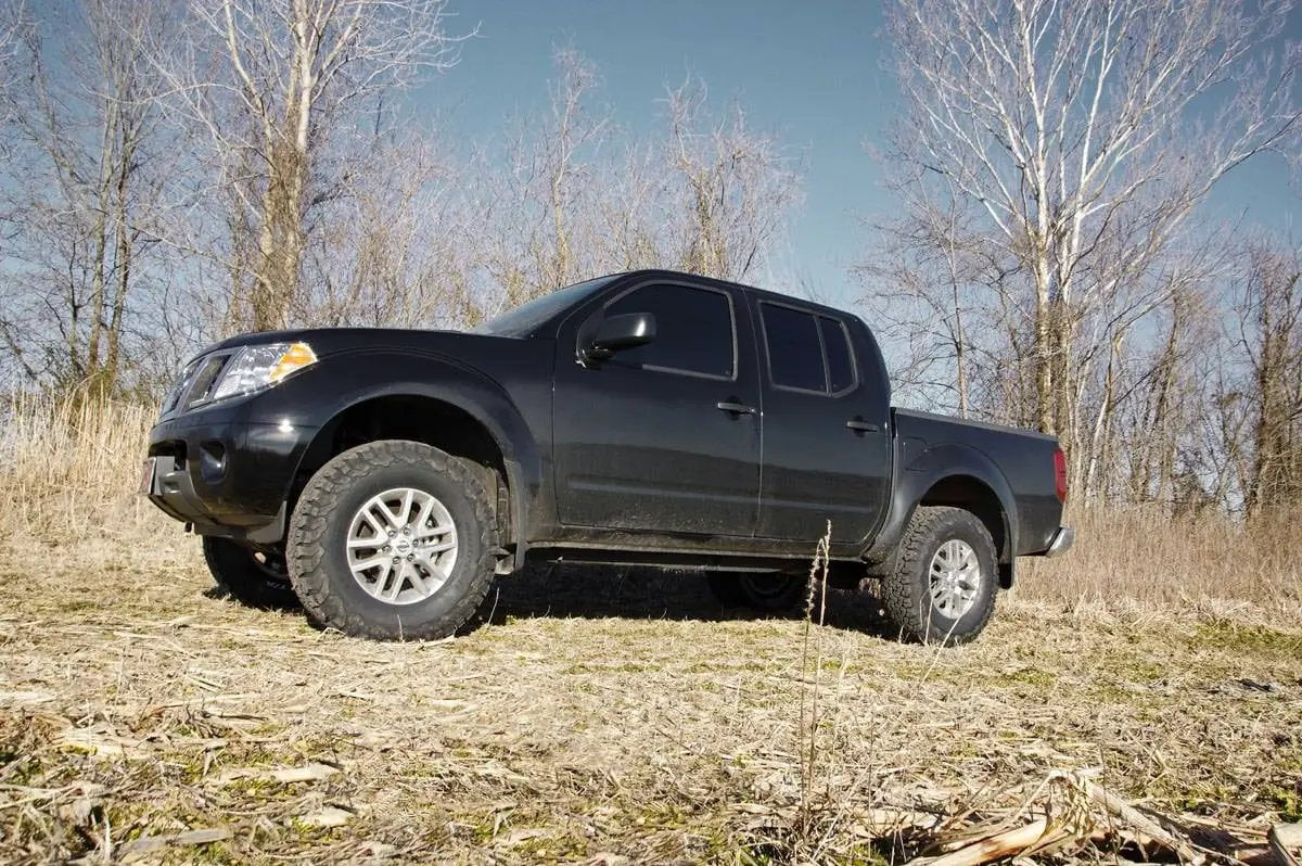 Rough Country 2.5 Inch Leveling Kit | Red Spacers | Nissan Frontier (05-26)/Xterra (05-15) by Rough Country
