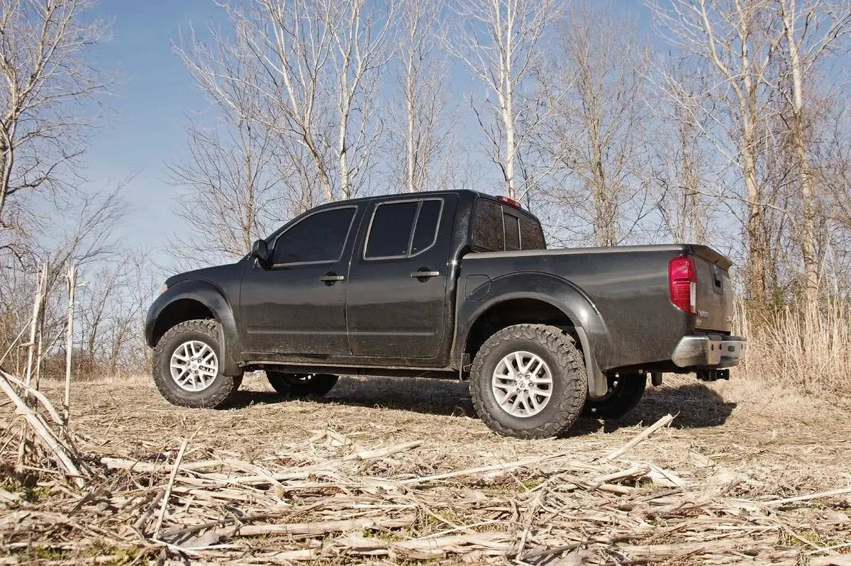 Rough Country 2.5 Inch Leveling Kit | Red Spacers | Nissan Frontier (05-26)/Xterra (05-15) by Rough Country