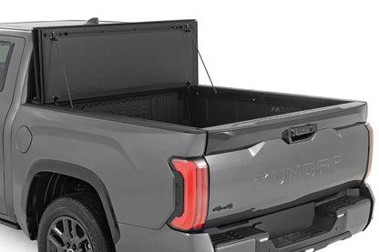 Rough Country Hard Tri-Fold Flip Up Bed Cover | 5'7" | Toyota Tundra 2WD/4WD (2022-2026) by Rough Country