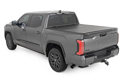 Rough Country Hard Tri-Fold Flip Up Bed Cover | 5'7" | Toyota Tundra 2WD/4WD (2022-2026) by Rough Country