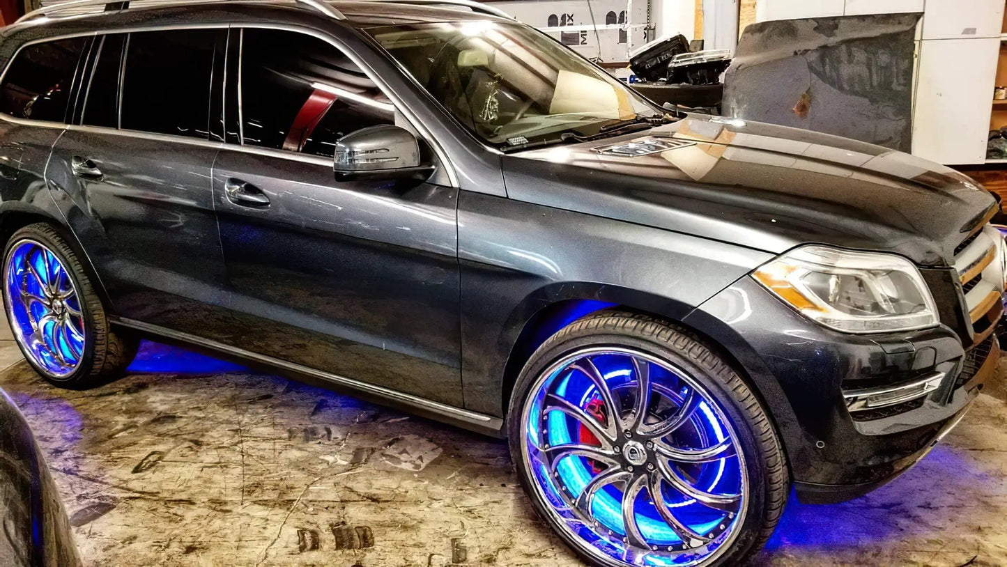 Oracle Lighting Double wide blue LED wheel ring with plug and play waterproof connectors. Consist of four illuminated rings which attach to dust shield. Rings include five mounting brackets. Universal vehicle application. by Oracle Lighting