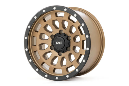 Rueda Rough Country Serie 87 | Beadlock simulado | Bronce/Negro | 17x8.5 | 5x5 | +0mm