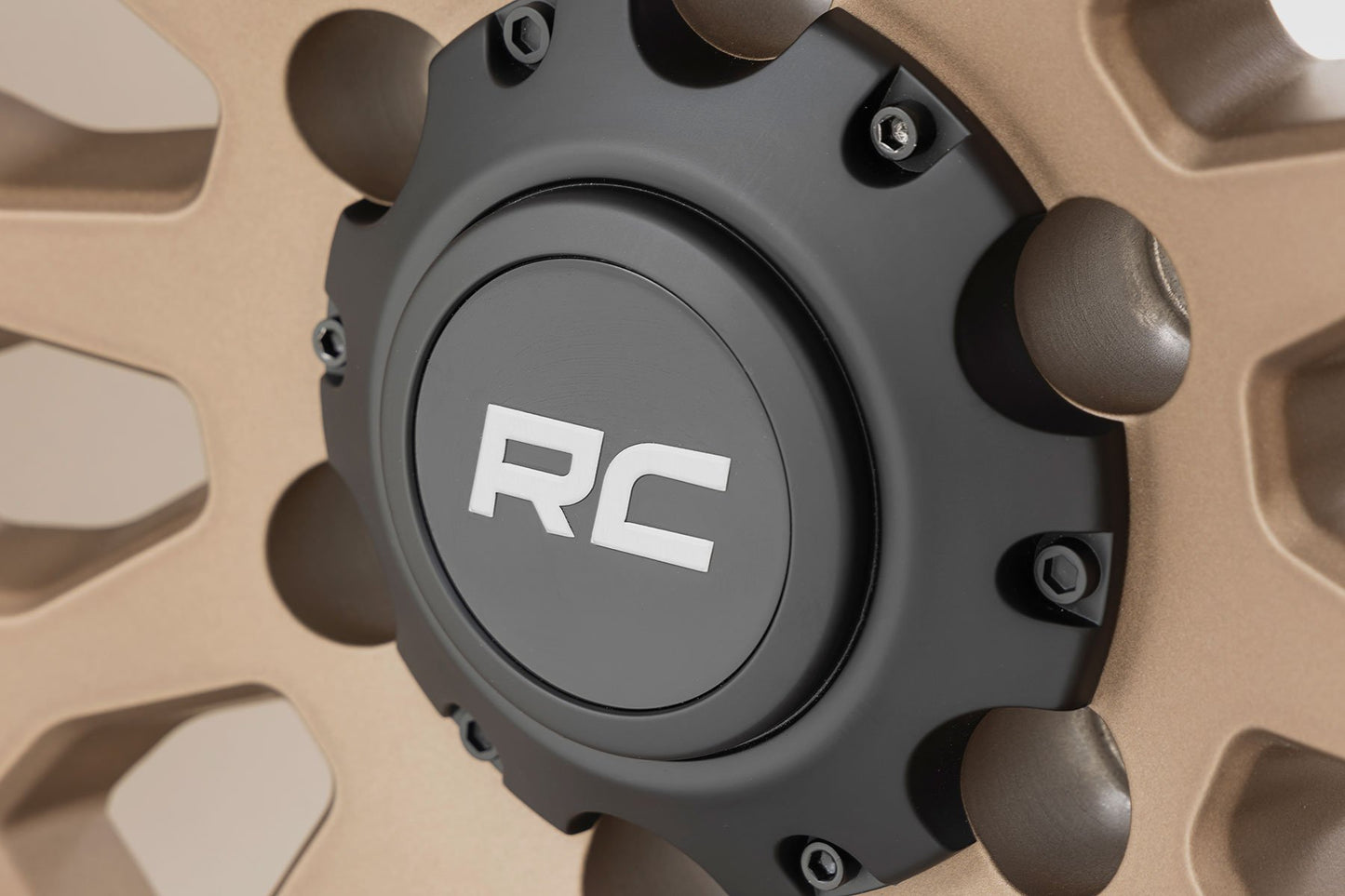 Rueda Rough Country Serie 87 | Beadlock simulado | Bronce/Negro | 17x8.5 | 5x5 | +0mm