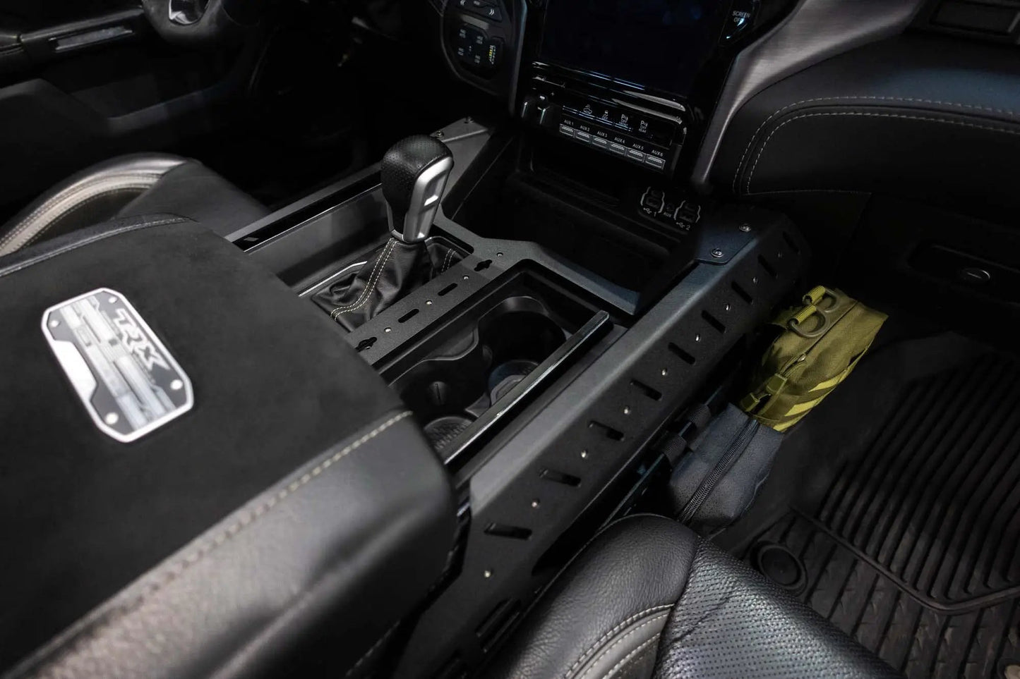 Addictive Desert Designs 2021-2025 Ram 1500 TRX/RHO Center Console Molle Panels & Digital Device Bridge by Addictive Desert Designs