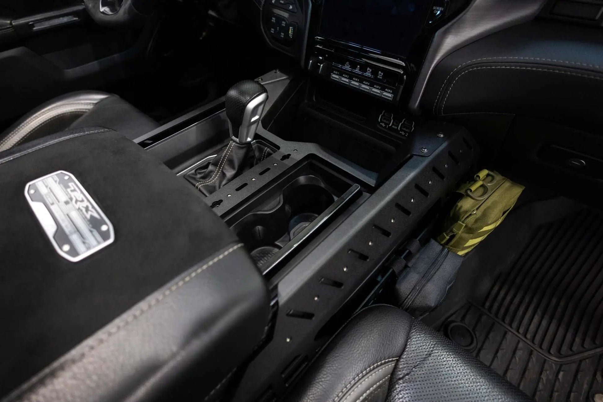 Addictive Desert Designs 2021-2025 Ram 1500 TRX/RHO Center Console Molle Panels & Digital Device Bridge by Addictive Desert Designs
