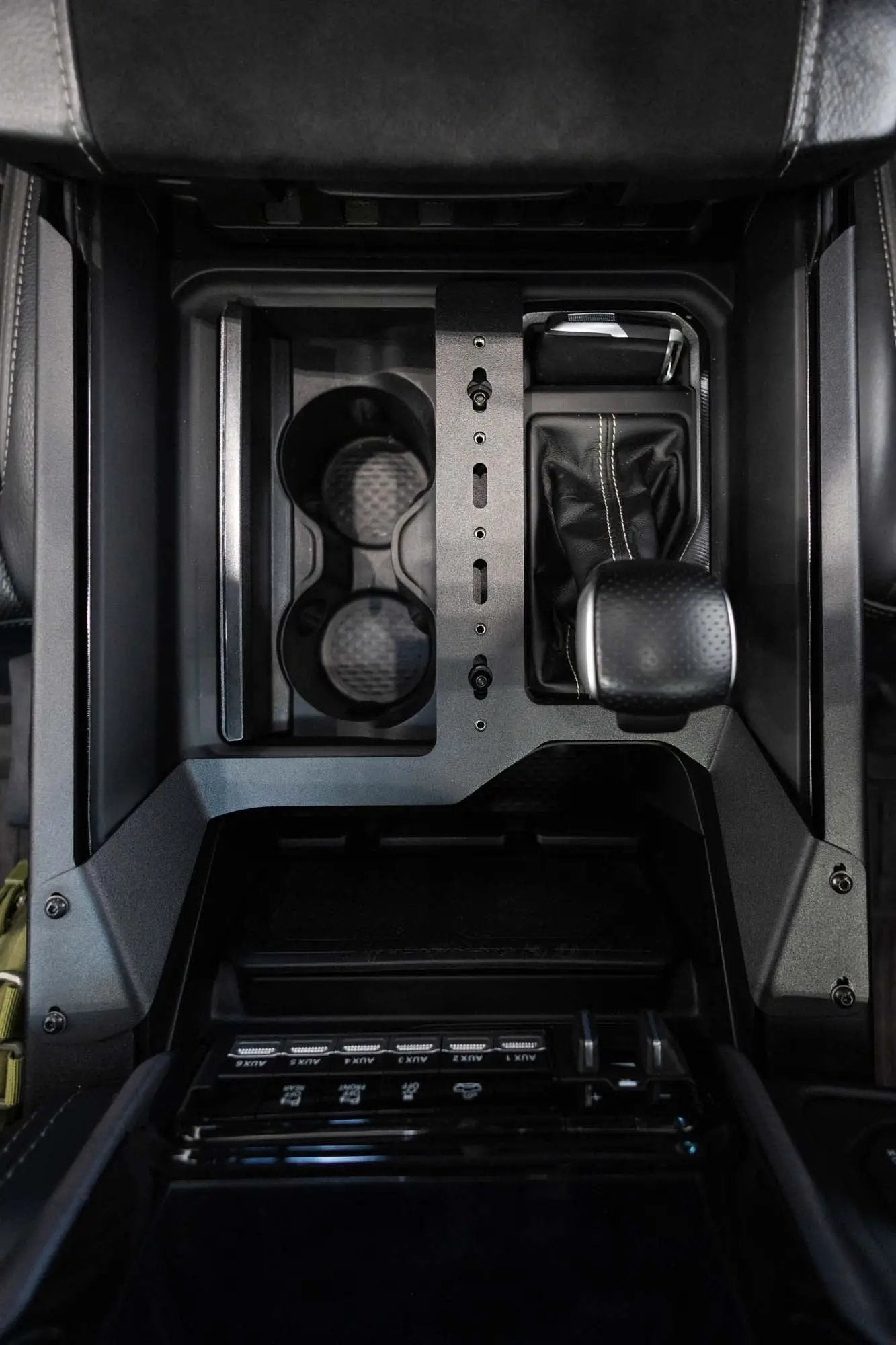 Addictive Desert Designs 2021-2025 Ram 1500 TRX/RHO Center Console Molle Panels & Digital Device Bridge by Addictive Desert Designs