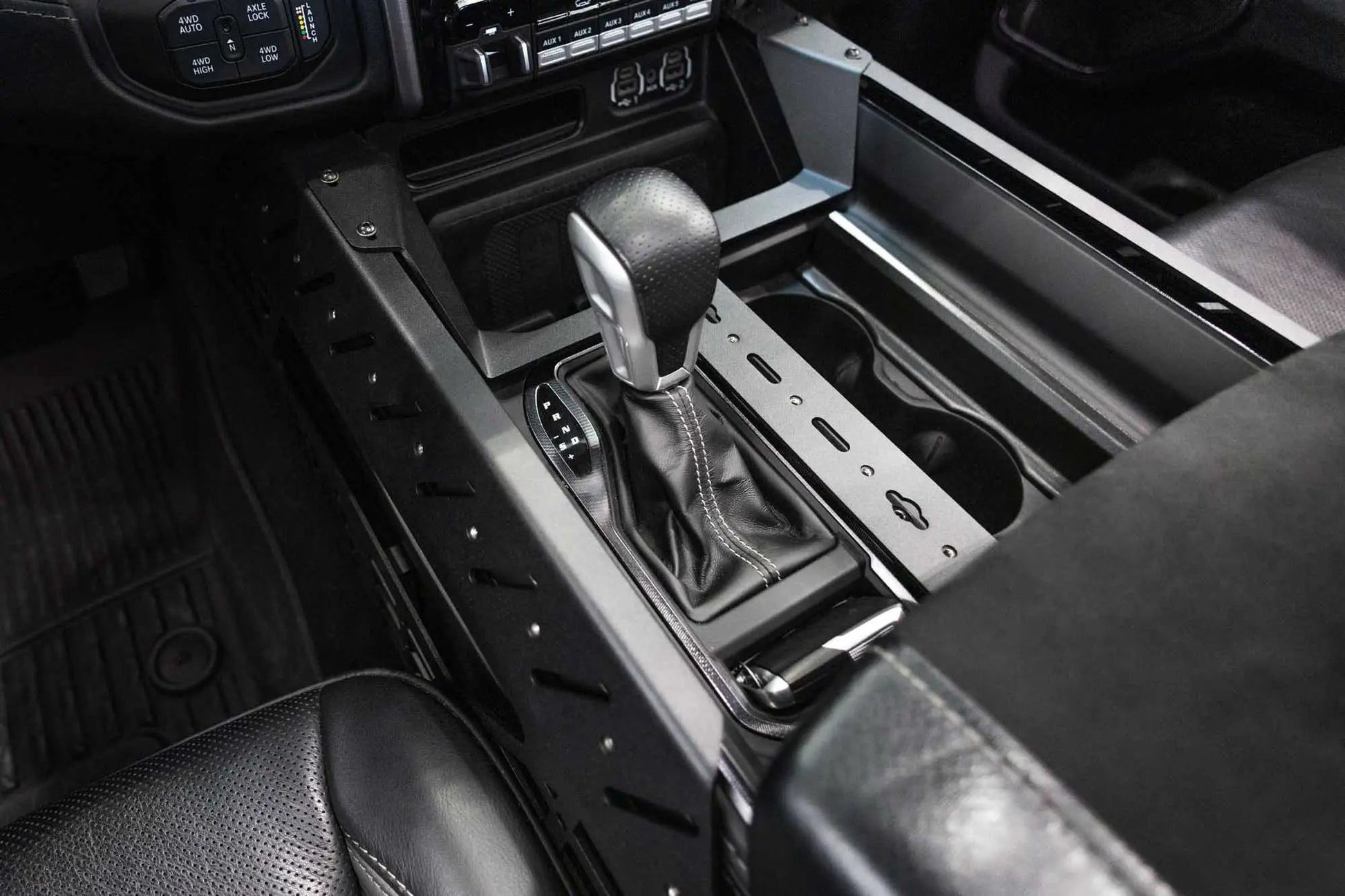 Addictive Desert Designs 2021-2025 Ram 1500 TRX/RHO Center Console Molle Panels & Digital Device Bridge by Addictive Desert Designs