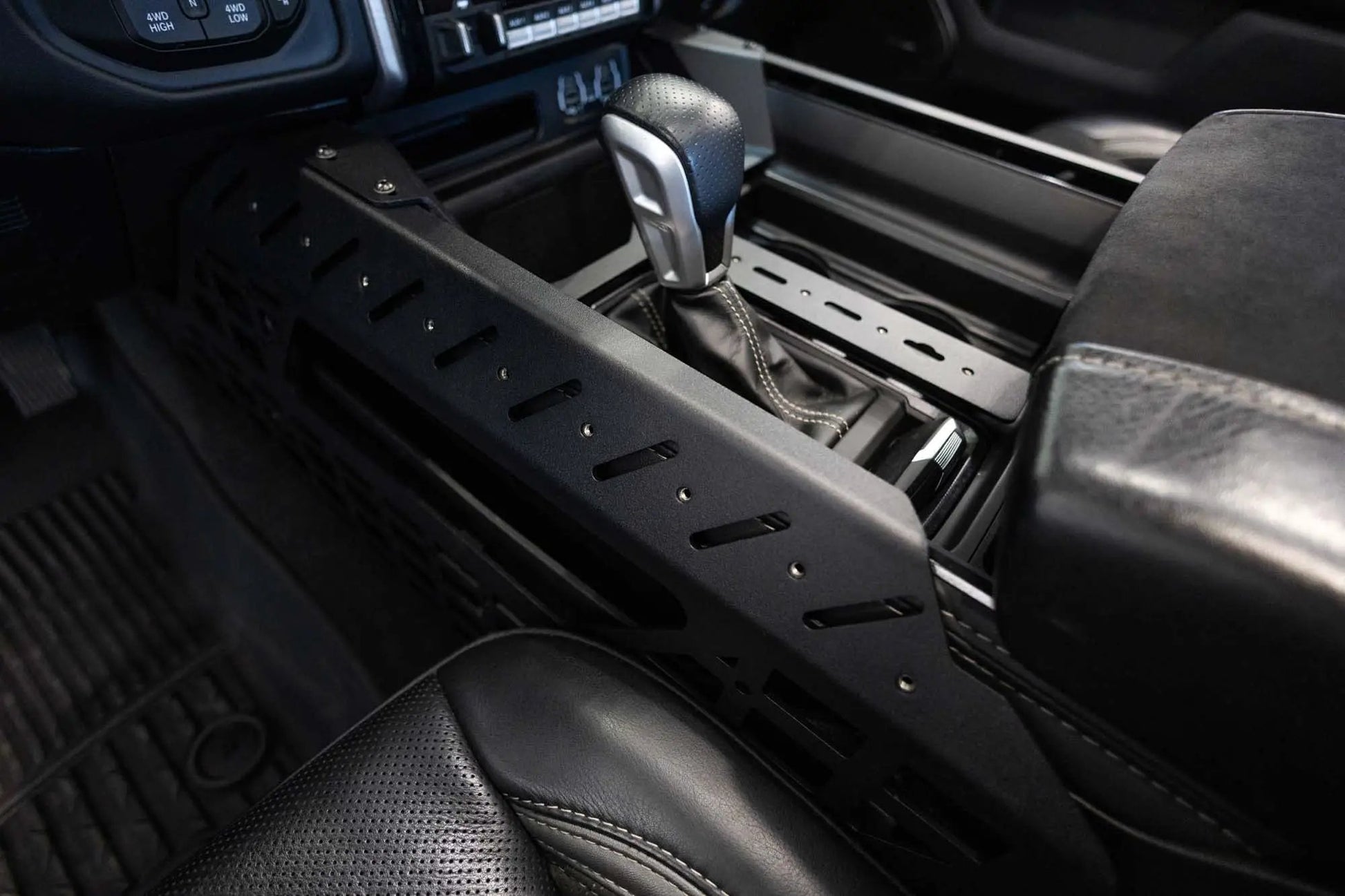 Addictive Desert Designs 2021-2025 Ram 1500 TRX/RHO Center Console Molle Panels & Digital Device Bridge by Addictive Desert Designs