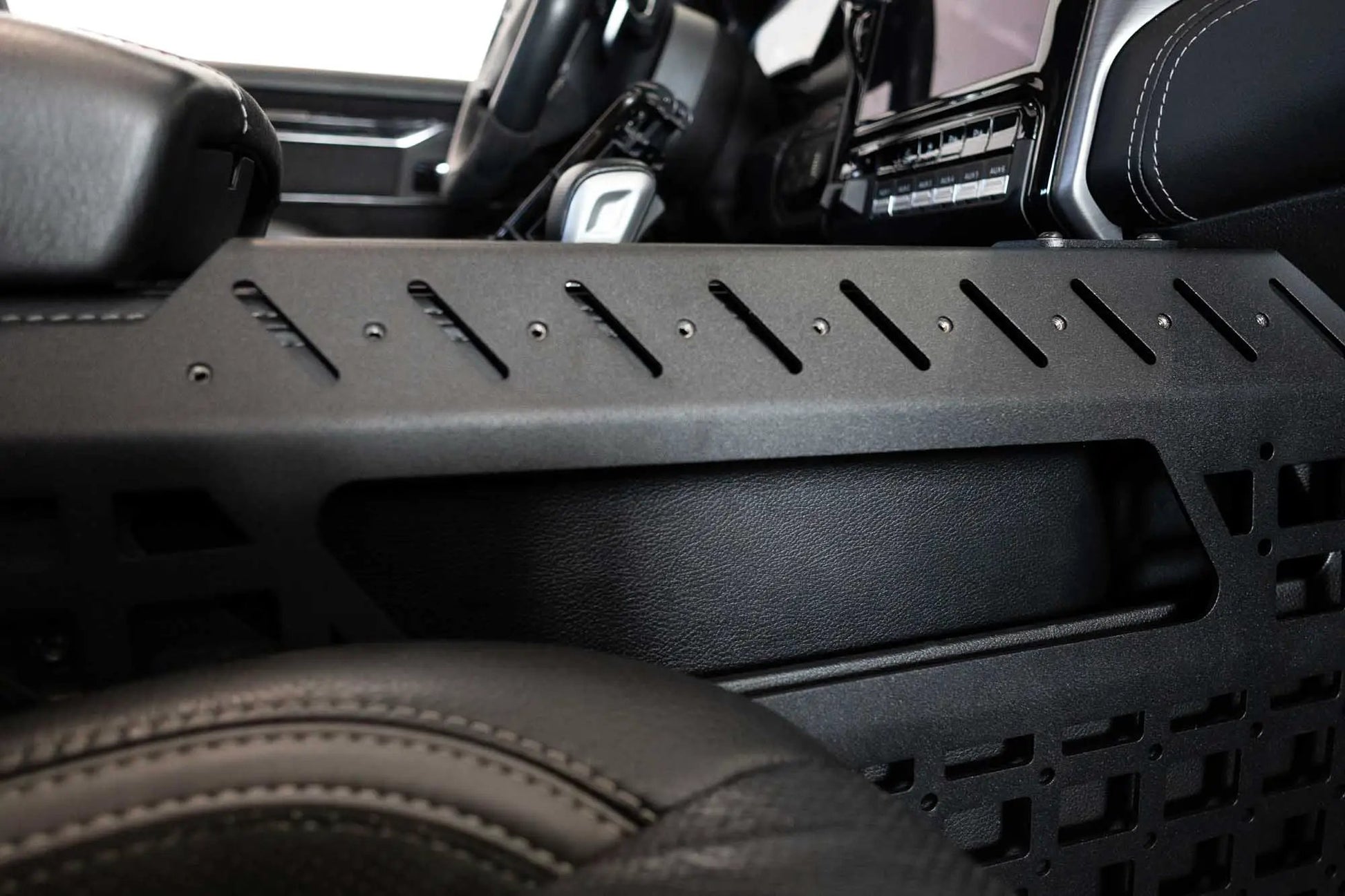 Addictive Desert Designs 2021-2025 Ram 1500 TRX/RHO Center Console Molle Panels & Digital Device Bridge by Addictive Desert Designs
