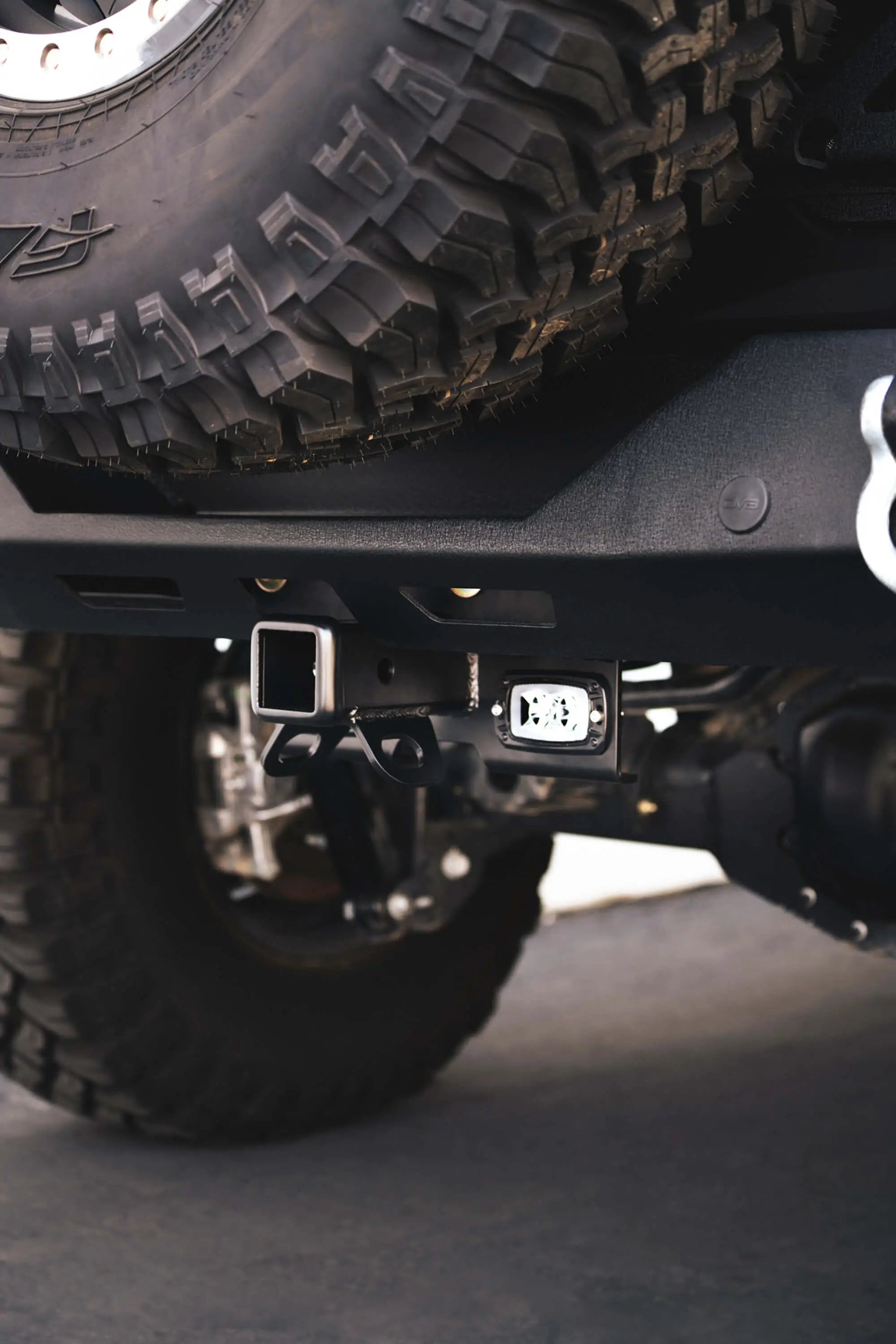 DV8 Offroad AHJP-02 is a bolt on hitch for the 07-22 Jeep Wrangler JK & JL. Constructed from steel & protected with a flat black powder coat, the hitch offers a 2in. receiver mount, (2) 3in. cube lights & installs in the factory location by DV8 Offroad