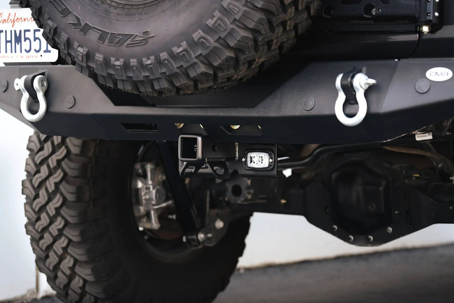 DV8 Offroad AHJP-02 is a bolt on hitch for the 07-22 Jeep Wrangler JK & JL. Constructed from steel & protected with a flat black powder coat, the hitch offers a 2in. receiver mount, (2) 3in. cube lights & installs in the factory location by DV8 Offroad