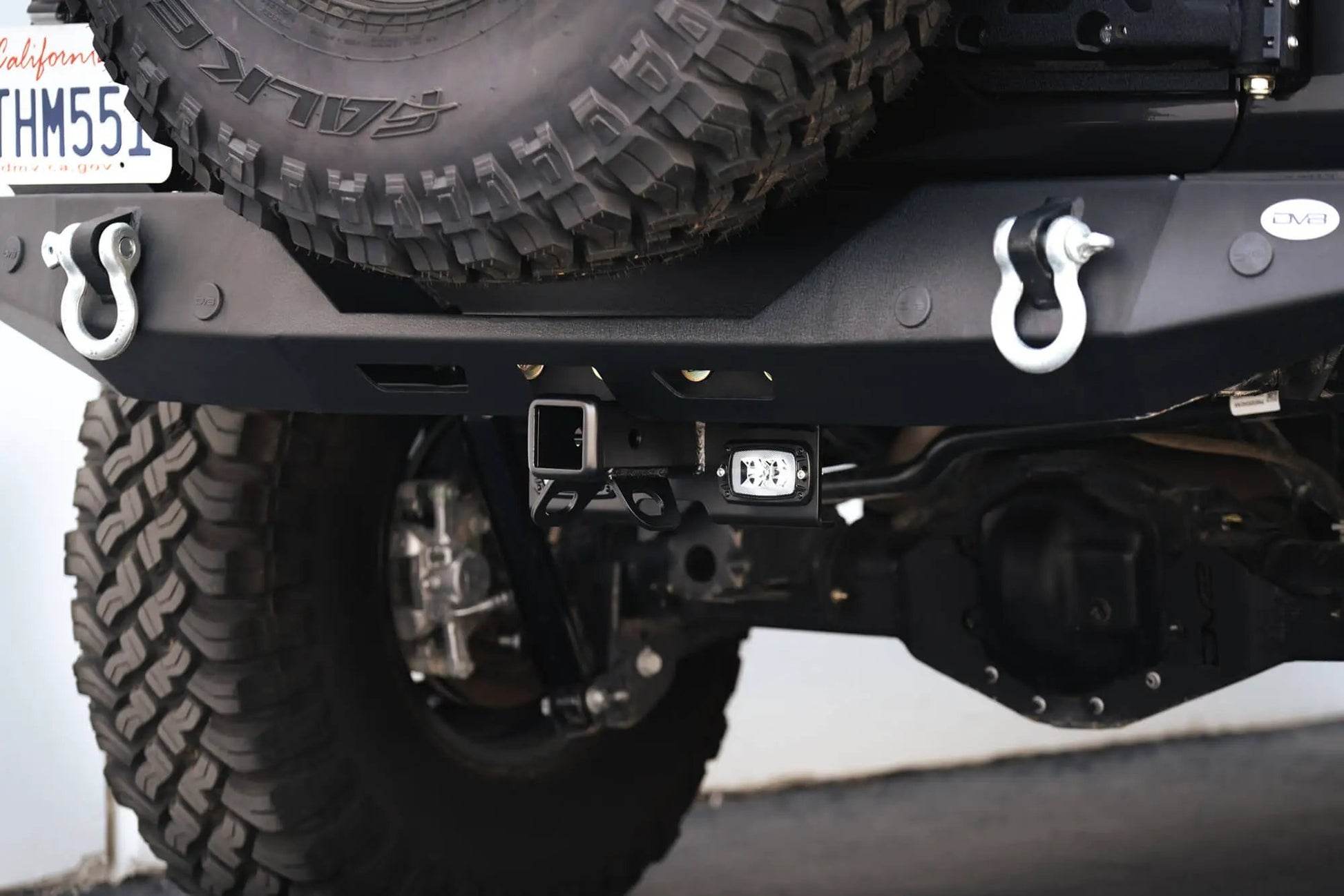 DV8 Offroad AHJP-02 is a bolt on hitch for the 07-22 Jeep Wrangler JK & JL. Constructed from steel & protected with a flat black powder coat, the hitch offers a 2in. receiver mount, (2) 3in. cube lights & installs in the factory location by DV8 Offroad