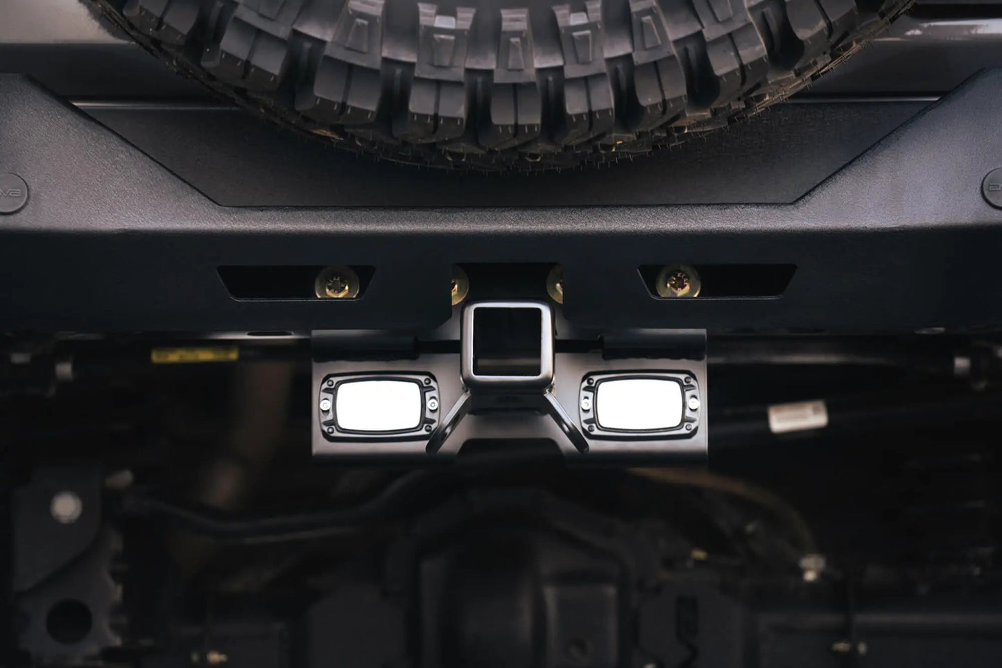 DV8 Offroad AHJP-02 is a bolt on hitch for the 07-22 Jeep Wrangler JK & JL. Constructed from steel & protected with a flat black powder coat, the hitch offers a 2in. receiver mount, (2) 3in. cube lights & installs in the factory location by DV8 Offroad