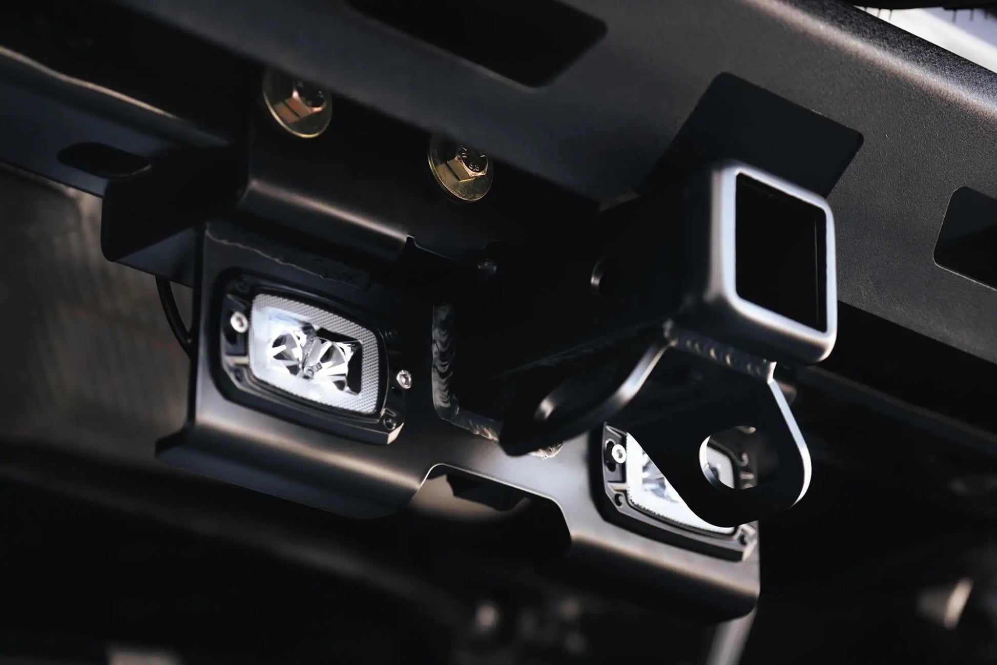 DV8 Offroad AHJP-02 is a bolt on hitch for the 07-22 Jeep Wrangler JK & JL. Constructed from steel & protected with a flat black powder coat, the hitch offers a 2in. receiver mount, (2) 3in. cube lights & installs in the factory location by DV8 Offroad
