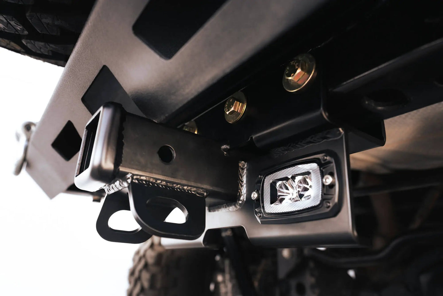 DV8 Offroad AHJP-02 is a bolt on hitch for the 07-22 Jeep Wrangler JK & JL. Constructed from steel & protected with a flat black powder coat, the hitch offers a 2in. receiver mount, (2) 3in. cube lights & installs in the factory location by DV8 Offroad