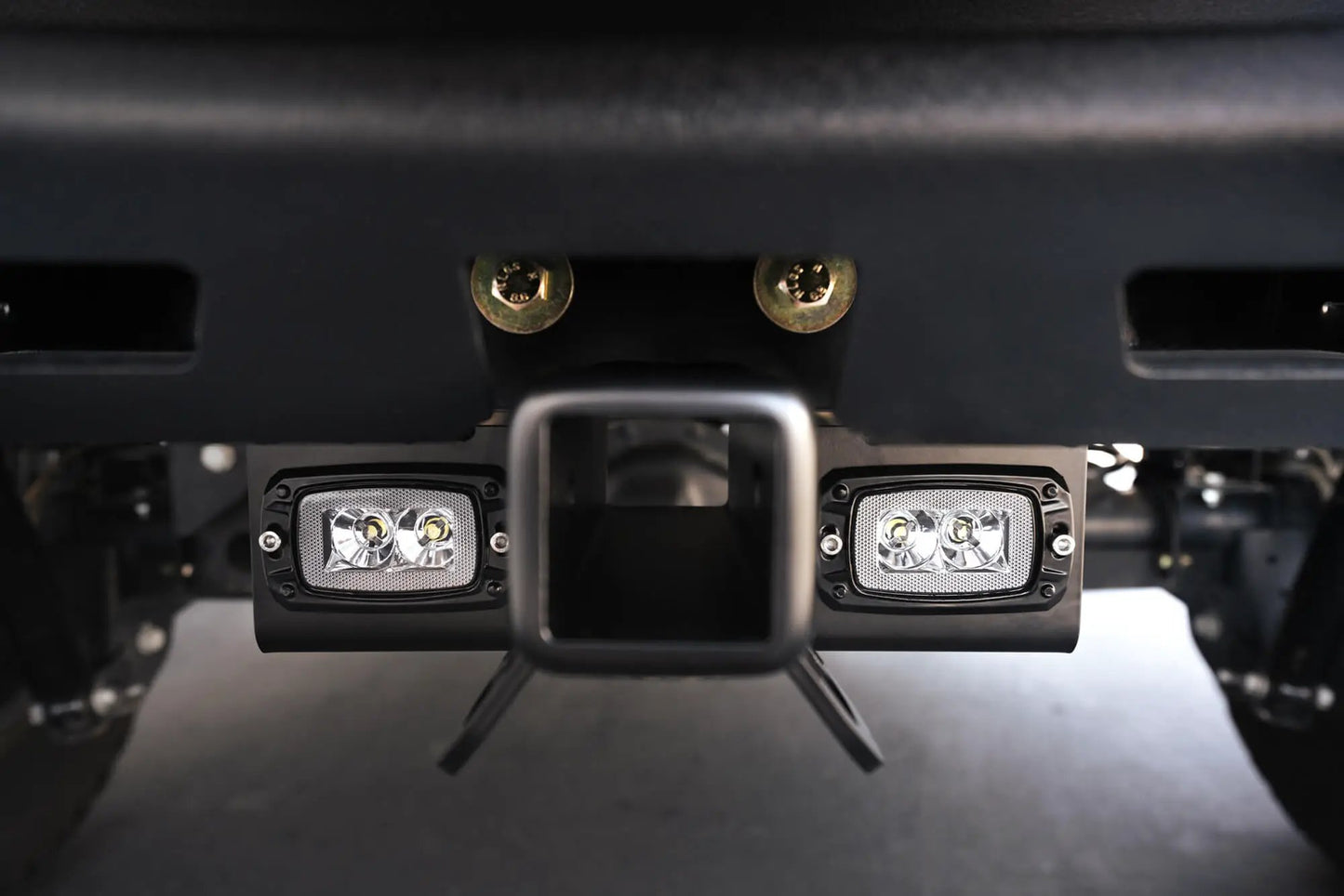 DV8 Offroad AHJP-02 is a bolt on hitch for the 07-22 Jeep Wrangler JK & JL. Constructed from steel & protected with a flat black powder coat, the hitch offers a 2in. receiver mount, (2) 3in. cube lights & installs in the factory location by DV8 Offroad