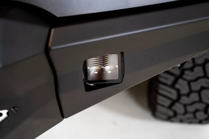 DV8 Offroad The BE3EW40W is a 3in. cube light from the Elite Series lights. Offering a flood beam pattern, the 3in. cube light offers a 4,800 lumen output, a bezel-less IP-68 lens, indirect reflectors, small heat fins & pedestal or side mount options by DV8 Offroad