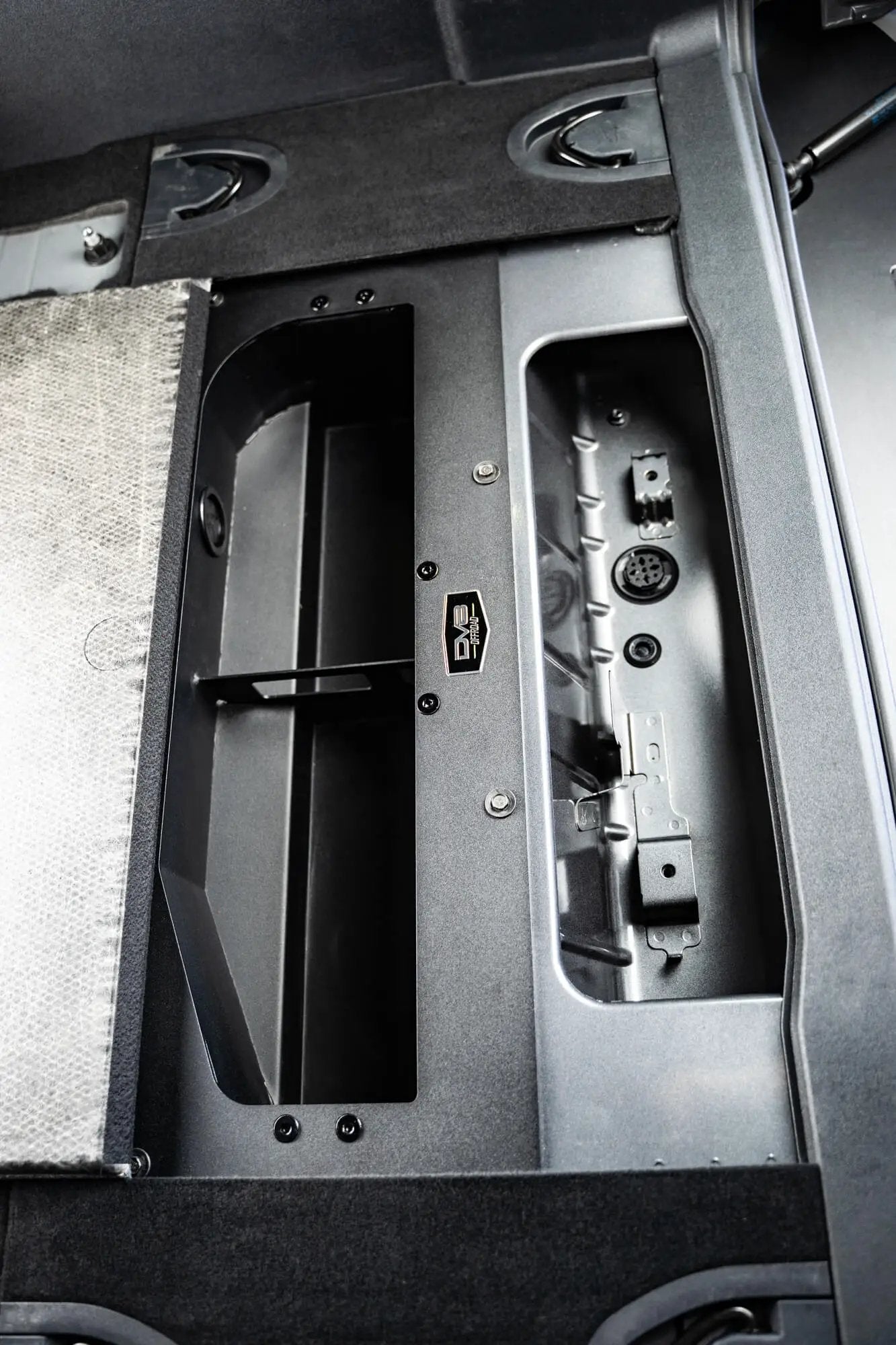 DV8 Offroad Hides the compressor in a convenient spot utilizing the factory mounting location. by DV8 Offroad