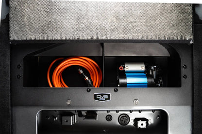 DV8 Offroad Hides the compressor in a convenient spot utilizing the factory mounting location. by DV8 Offroad