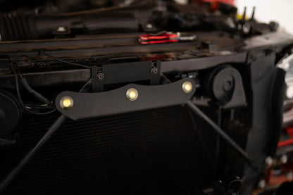 DV8 Offroad Set of three amber accent lights that install inside the front grill of the 20+ Jeep Gladiator JT. The mounting bracket is constructed from steel & powder coated & the LED lights allow your vehicle to be seen easier in low situations by DV8 Offroad