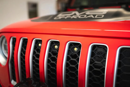 DV8 Offroad Set of three amber accent lights that install inside the front grill of the 20+ Jeep Gladiator JT. The mounting bracket is constructed from steel & powder coated & the LED lights allow your vehicle to be seen easier in low situations by DV8 Offroad