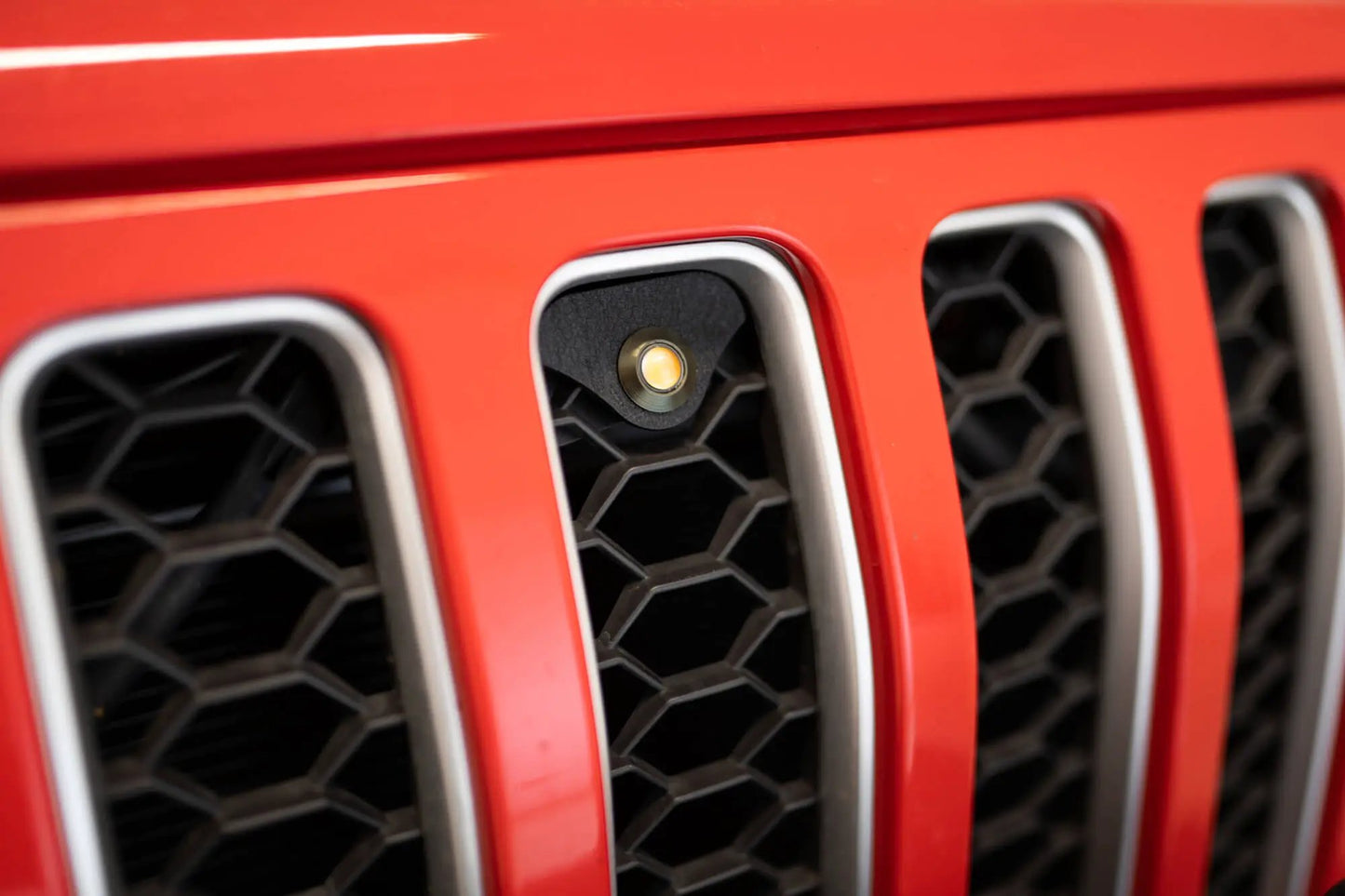 DV8 Offroad Set of three amber accent lights that install inside the front grill of the 18+ Jeep Wrangler JL. The mounting brackets are constructed from steel & powder coated & the LED lights allow your vehicle to be seen easier in low situations by DV8 Offroad