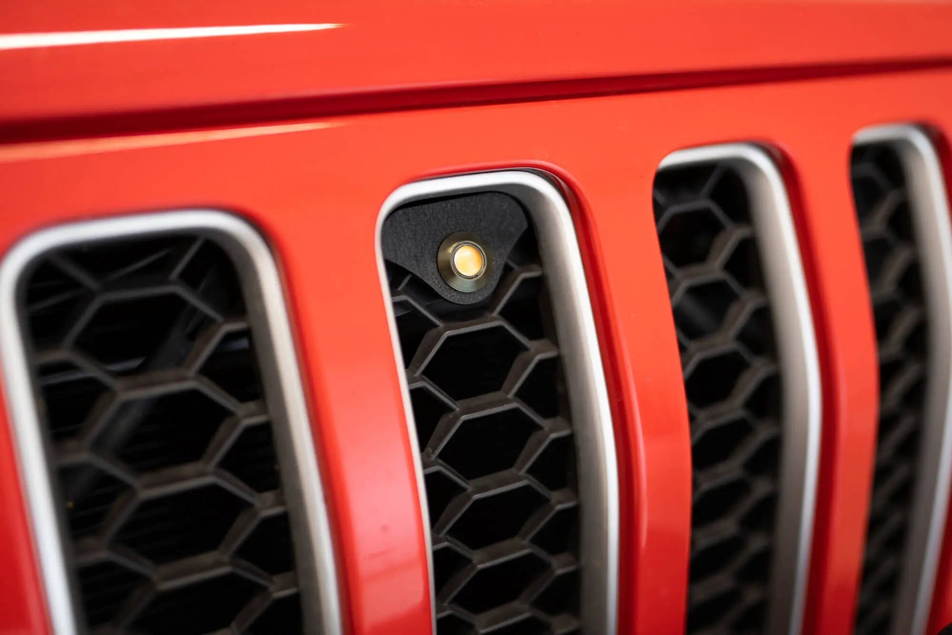 DV8 Offroad Set of three amber accent lights that install inside the front grill of the 18+ Jeep Wrangler JL. The mounting brackets are constructed from steel & powder coated & the LED lights allow your vehicle to be seen easier in low situations by DV8 Offroad