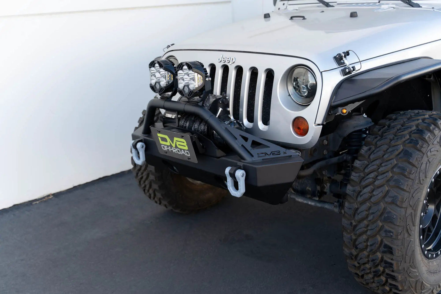 DV8 Offroad Fairlead Mounted Flip-Up License Plate Bracket by DV8 Offroad