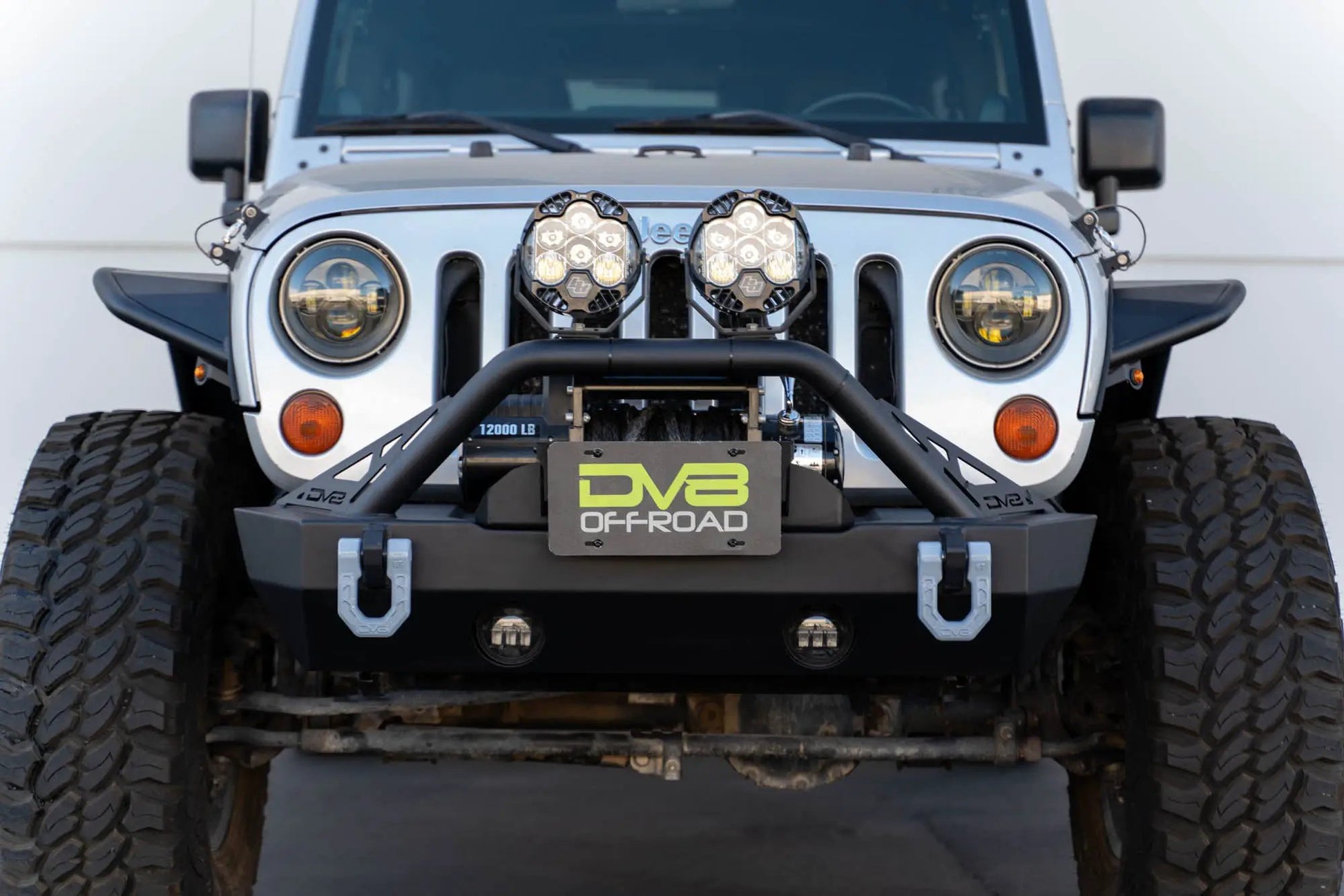 DV8 Offroad Fairlead Mounted Flip-Up License Plate Bracket by DV8 Offroad