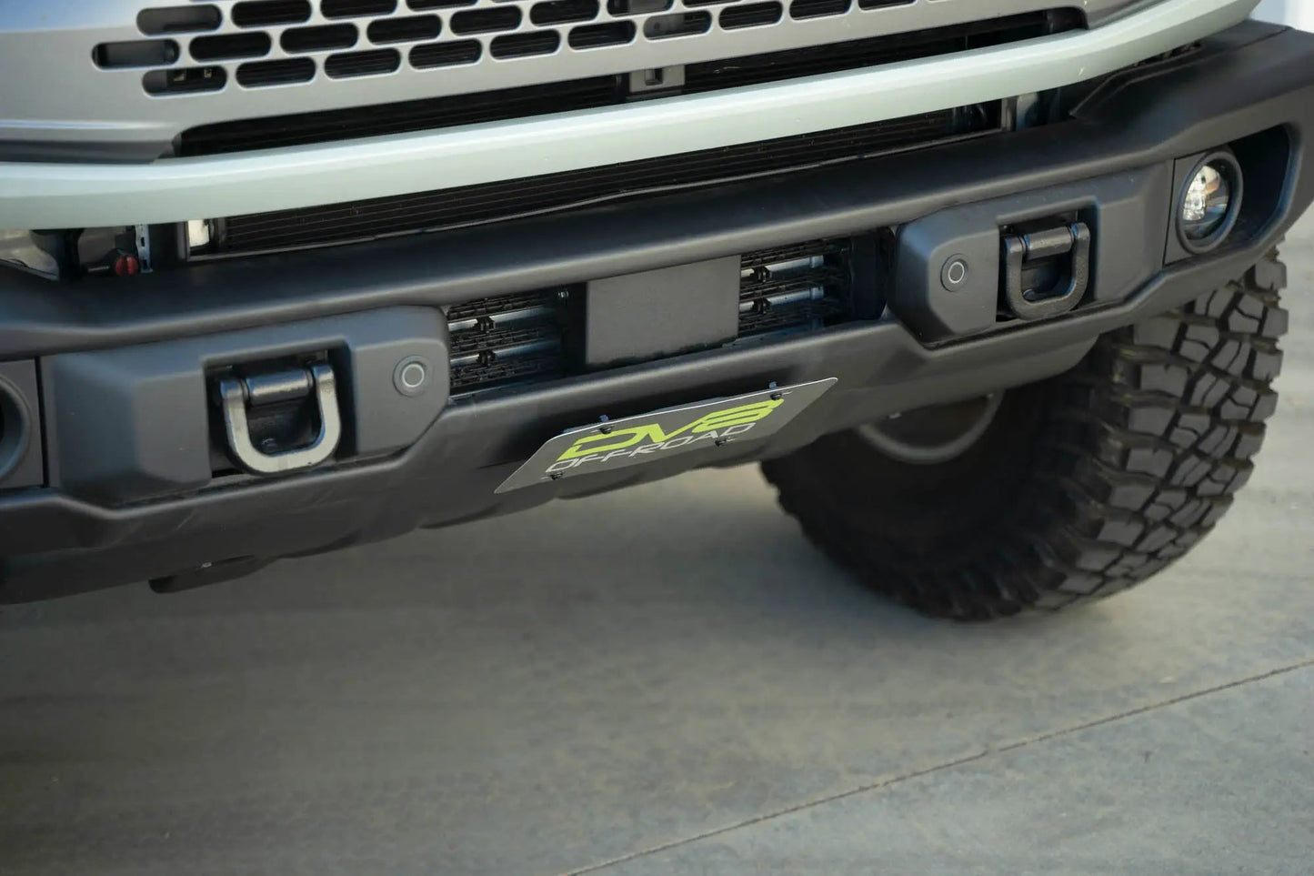 DV8 Offroad Ford Bronco Capable Bumper Slanted Front License Plate Mount by DV8 Offroad