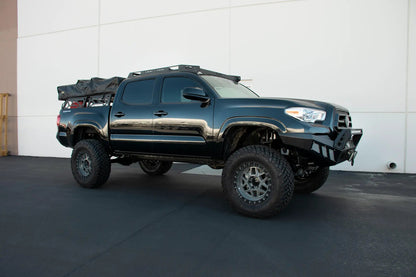 DV8 Offroad RRUN-01 is an adjustable bed mounted overland rack. The RRUN-01 is 8in. tall x 55in. wide and designed for both the Jeep Gladiator JT & Toyota Tacoma. Included are (2) Roto Pax mounts, (8) D-rings and a spot for a 6in. single row light bar