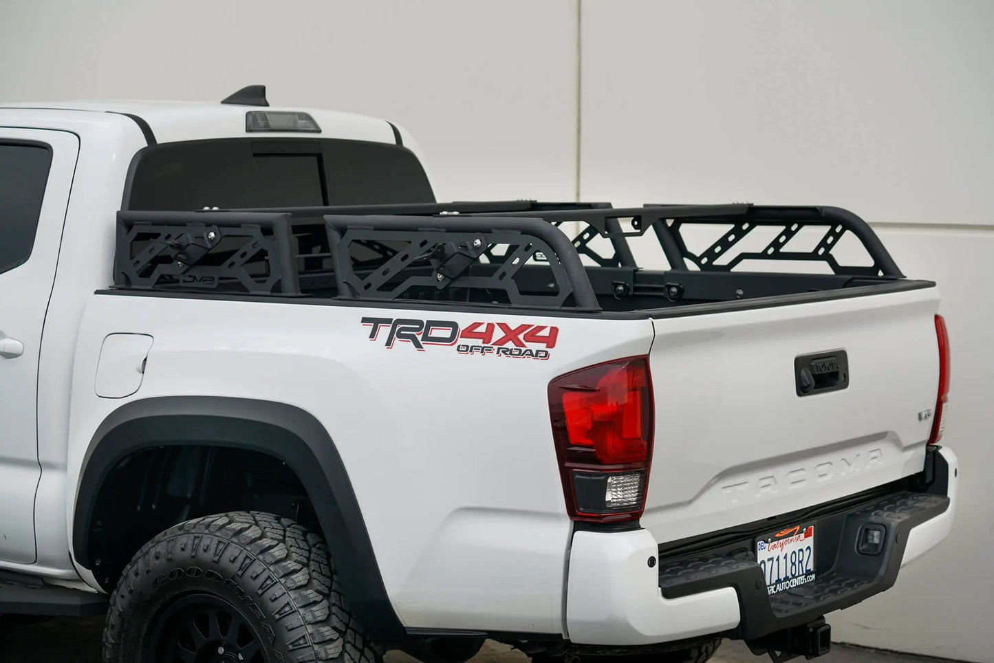 DV8 Offroad RRUN-01 is an adjustable bed mounted overland rack. The RRUN-01 is 8in. tall x 55in. wide and designed for both the Jeep Gladiator JT & Toyota Tacoma. Included are (2) Roto Pax mounts, (8) D-rings and a spot for a 6in. single row light bar by DV8 Offroad