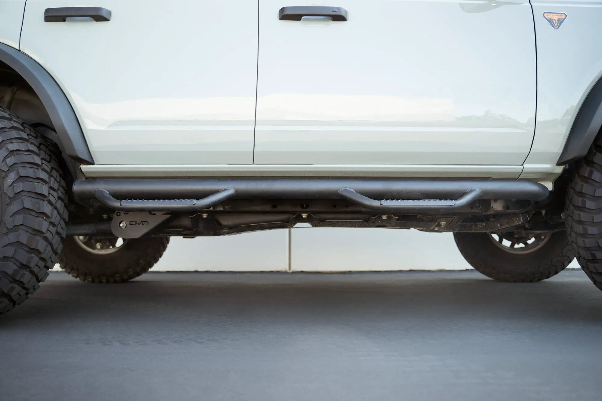DV8 Offroad Heavy duty frame-side trailing arm skid plate to prevent you from getting hung up on those pesky rocks. by DV8 Offroad