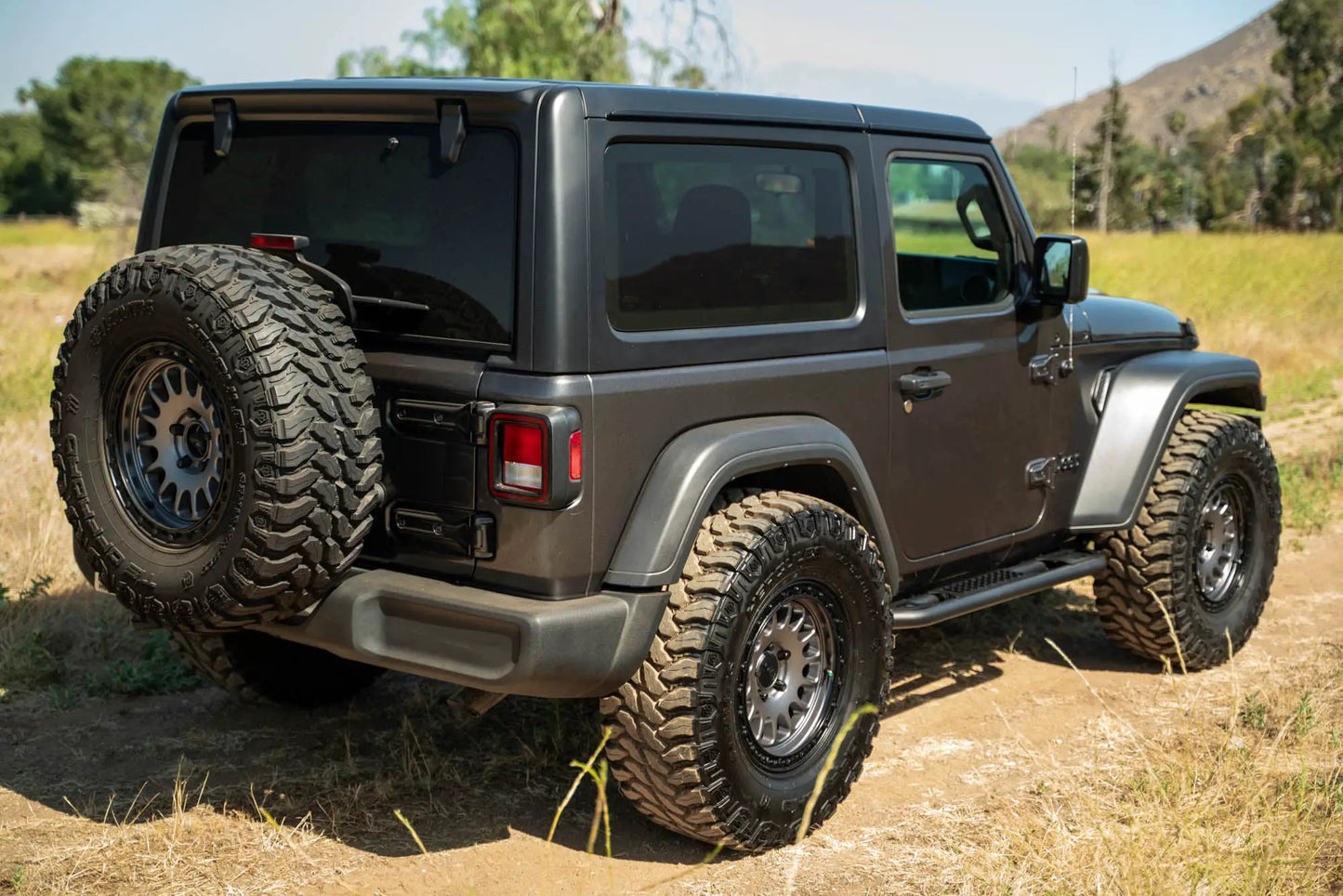 DV8 Offroad 2-Door Jeep Wrangler JL OE Plus Side Steps by DV8 Offroad
