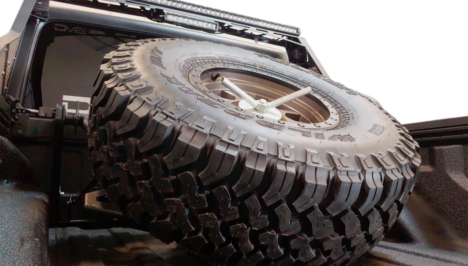 DV8 Offroad Jeep JT Adjustable Tire Carrier by DV8 Offroad