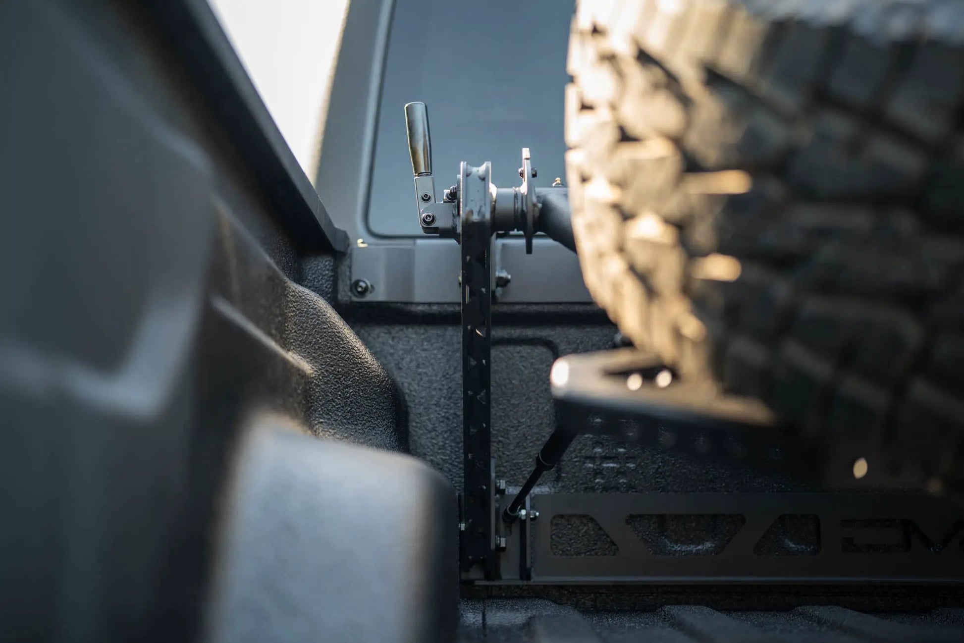 DV8 Offroad 2020-2025 Jeep Gladiator JT Adjustable In-Bed Tire Carrier by DV8 Offroad