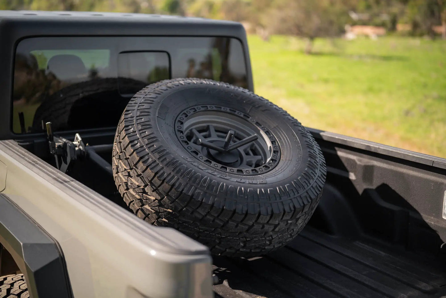 DV8 Offroad 2020-2025 Jeep Gladiator JT Adjustable In-Bed Tire Carrier by DV8 Offroad