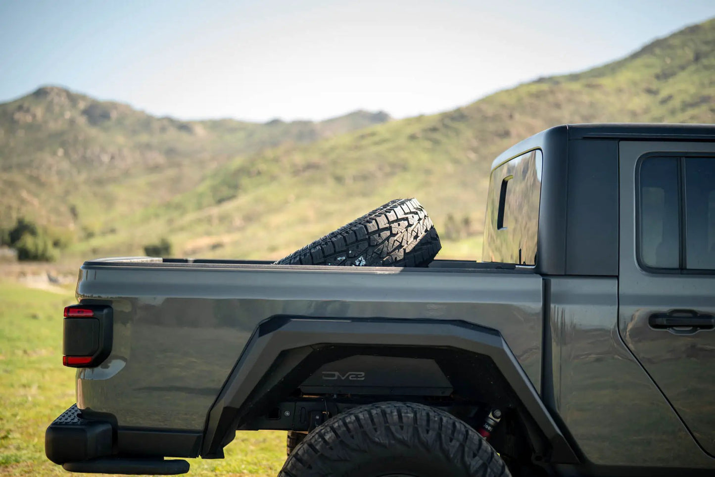 DV8 Offroad 2020-2025 Jeep Gladiator JT Adjustable In-Bed Tire Carrier by DV8 Offroad