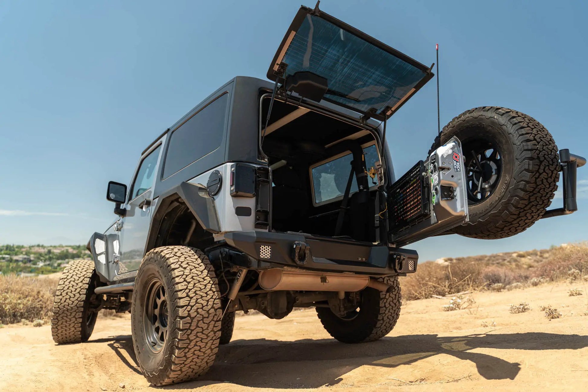 DV8 Offroad 2007-2018 Jeep Wrangler JK Body Mounted Tire Carrier by DV8 Offroad